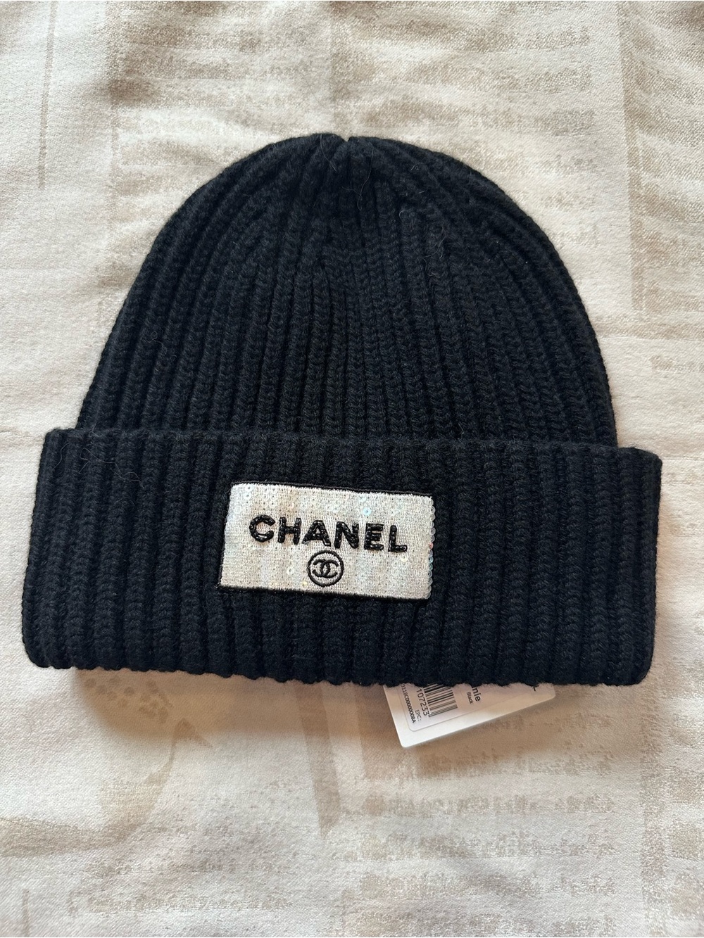 CHANEL Black Ribbed Knit Cuff Beanie with Logo Patch